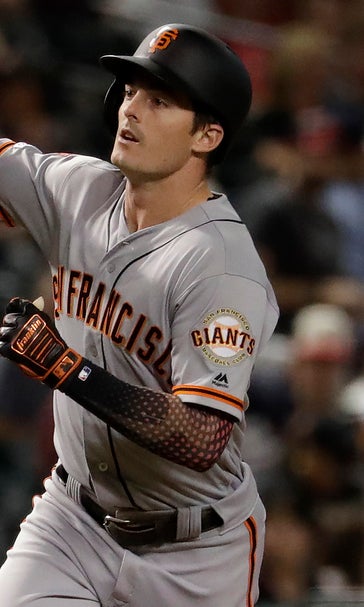 Yastrzemski hits 3 HRs, Giants beat D'backs in 11 innings